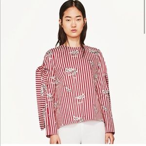 Printed top with bow sleeves